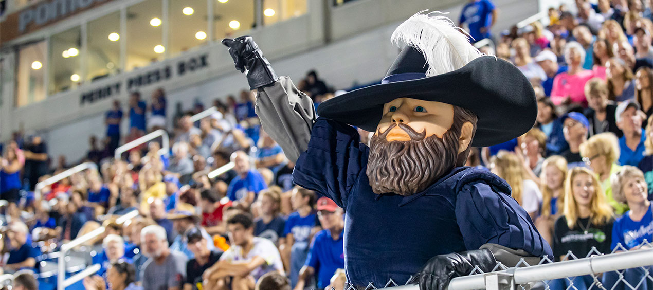 Captain Chris cheers in the stands