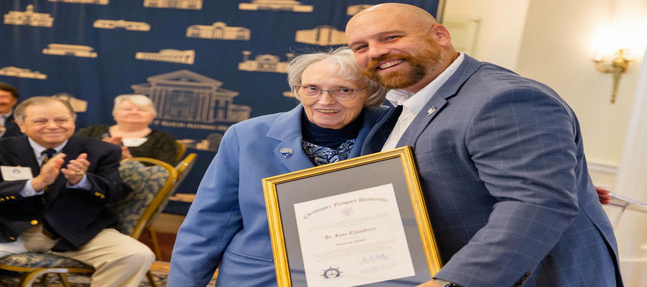 Dr. Jane Chambers accepts an award